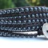 wrap, hammered button, adjustable, designer inspired, takes 2-4 hours to make, handcrafted, hematite, black, semiprecious stones