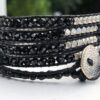 wrap, wraps around wrist, zinc, silver, black, lava stone, hammered button, adjustable, handcrafted, takes 2-4 hours to make, waxed cord, designer inspired